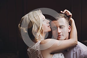 Female and male portrait. Lady and guy outdoors.Wedding couple in love, close-up portrait of young and happy bride and groom at we