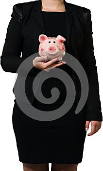 Female manager holding a piggy bank