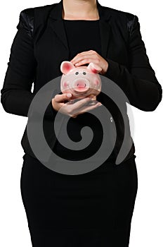 Female manager holding a piggy bank