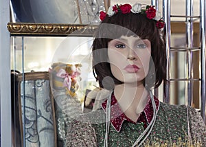 Female mannequin in a clothing store. Trading equipment - female plastic dummy