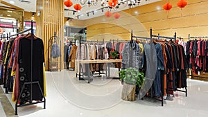 Female mannequin winter clothing store interior