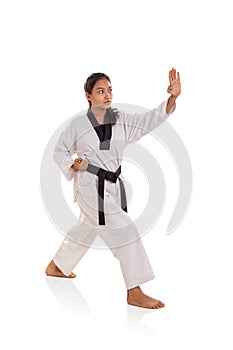 Female martial artist palm strike full length