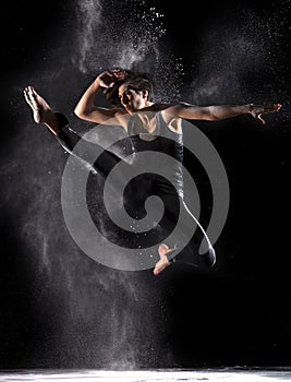 Female Martial Artist with Powder Jump Front Kick