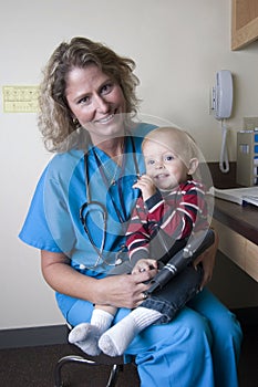 Female medical professional with child