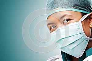 Female medical worker gazing to camera