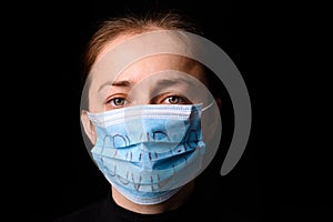Female Medical Worker Wearing Protective Face Mask. Covid-19 protection
