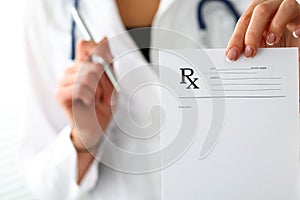 Female medicine doctor hand give prescription to patient