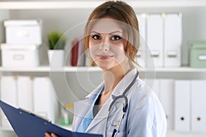 Female medicine doctor at her office