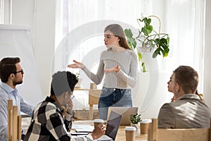 Female mentor head meeting talking to colleague