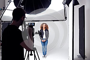 Female Model Working On Set In Photographic Or Film Studio