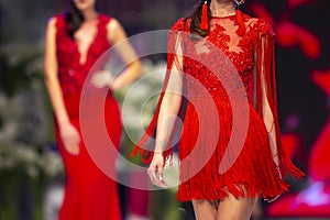 Fashion catwalk runway show models red dress