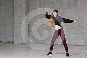 Female modern style dancer in motion.
