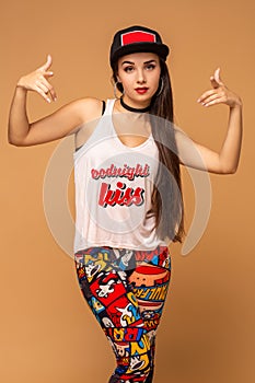 Female modern style dancer posing in the studio.