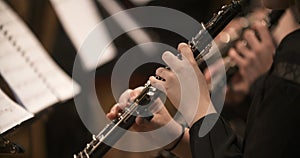 Female musician playing clarinet during concert