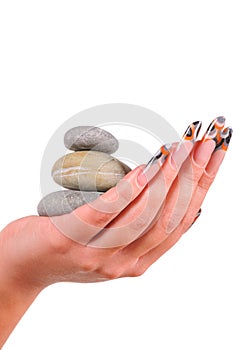 Female nails with pebbles