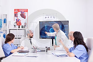 Female neurologist reading brain waves