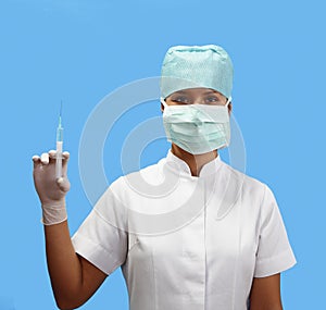 Female nurse holding a syringe