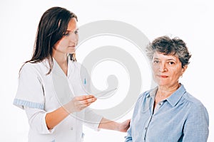 Female nurse wanting to take patient's temperature