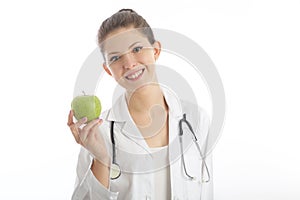 Female nutritionist holding a green apple