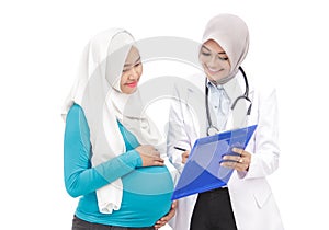 Female obstetrician explaining the result of examination to her