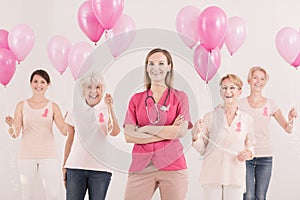 Female oncologist and cancer survivors photo