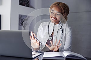 Female online doctor having online consultation with patient