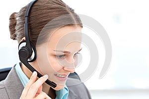 Female operator on the phone with earpiece