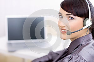 Female operator talking on headset