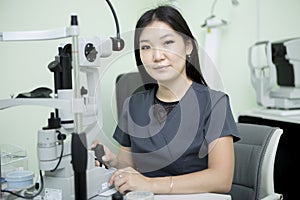 Female ophthalmologist at workplace