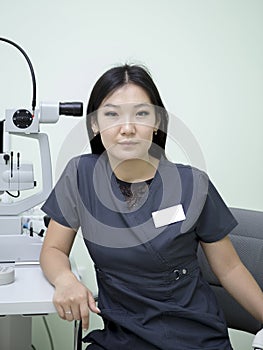 Female ophthalmologist at workplace