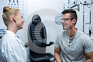 Female optometrist interacting with patient