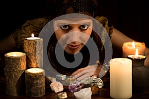 Oracle with healing stones and Candles, concept Strenght and Love photo