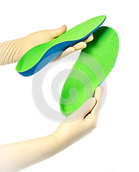 Female orthopedist with insole