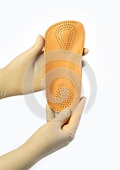 Female orthopedist with insole