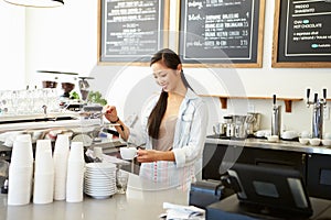 Female Owner Of Coffee Shop