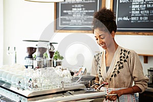 Female Owner Of Coffee Shop