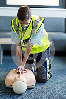 Female paramedic during cardiopulmonary resuscitation training