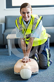 Female paramedic during cardiopulmonary resuscitation training