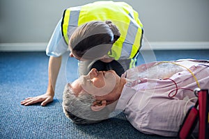 Female paramedic during cardiopulmonary resuscitation training