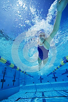 Female Participant Swimming Underwater