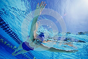 Female Participant Swimming Underwater photo