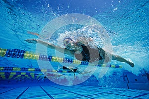 Female Participants Competing In Swimming Race