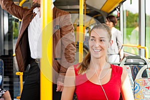 Female passenger in a bus