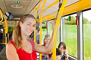 Female passenger in a bus