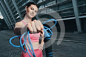 Female passing a skipping rope with right hand