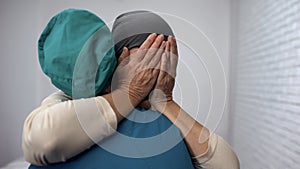 Female patient crying learn about unsuccessful chemotherapy, advanced cancer