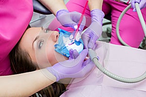 Female patient on a dentis