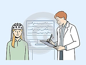 Female patient do EEG scan in clinic