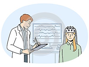 Female patient do EEG scan in clinic