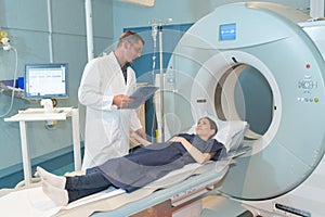 Female patient talking to doctor before mri scan